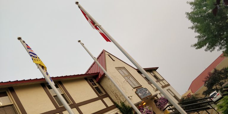 Three poles, two flags & one symbol up for debate