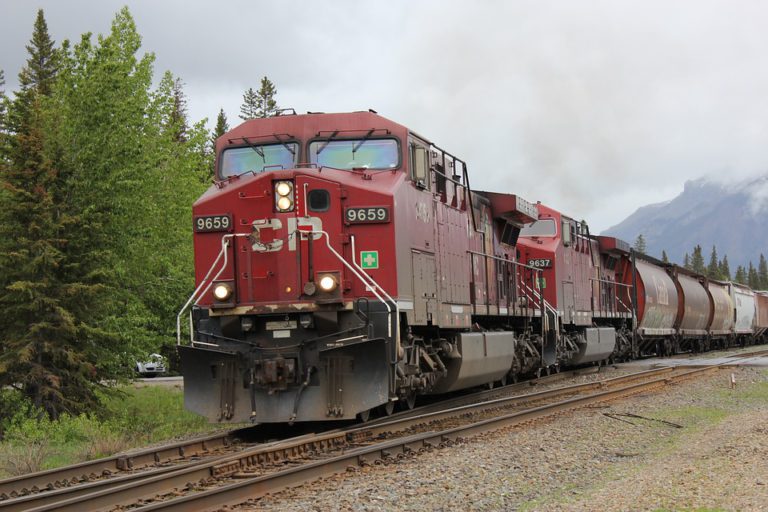 UPDATE: Three injured after vehicle lands near train tracks off Highway 3