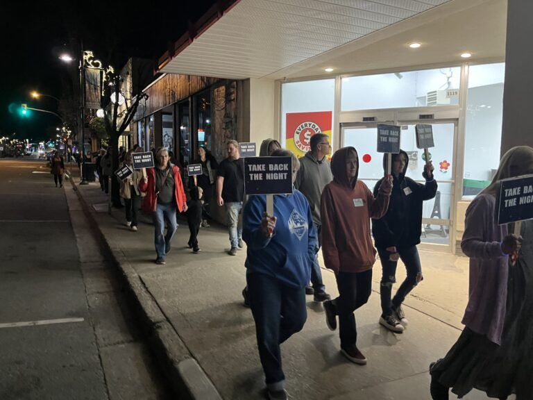 Take Back the Night marchers through Creston